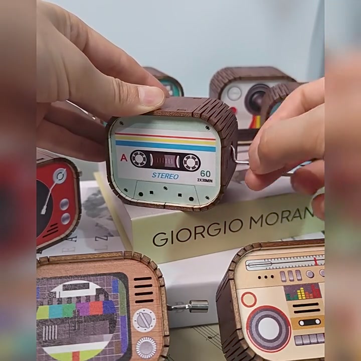 Retro hand-cranked music box ad creative